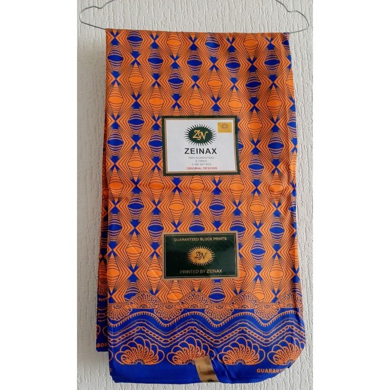 Kledingstof oranje/ donkerblauwe African print