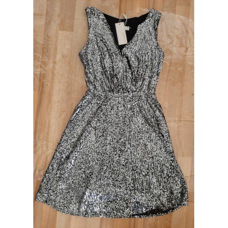 Sleeveless ladies dress with silver colored sequins