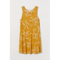 Ladies dress with leaf motifs