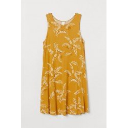 Ladies dress with leaf motifs